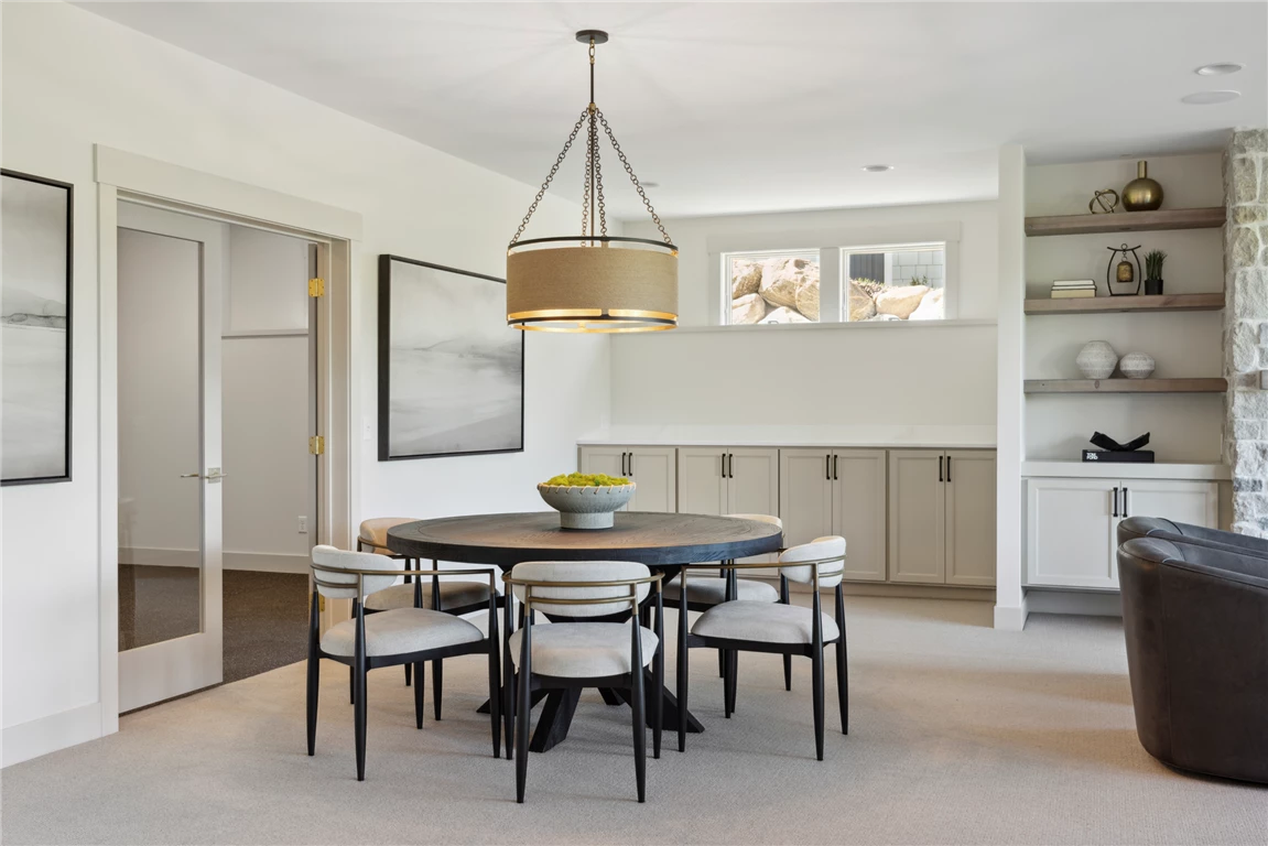 Contemporary basement living room with luxury decor and modern furniture.