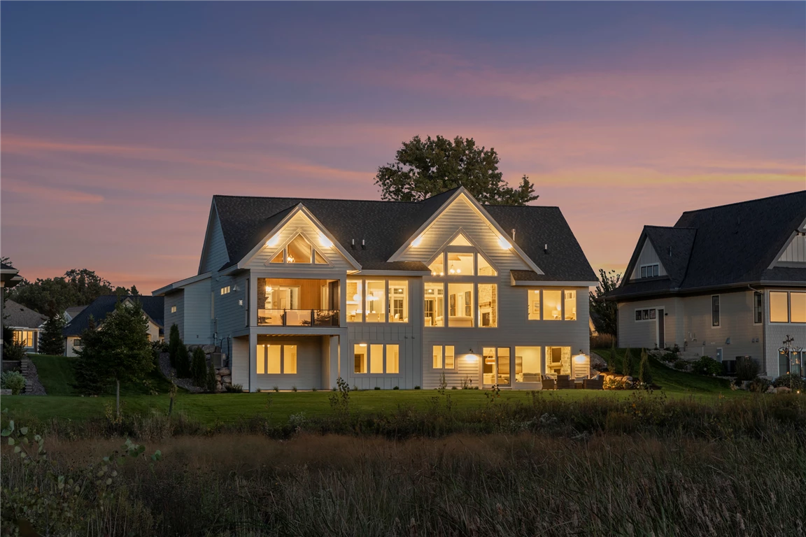 Exterior view of a suburban home with elegant architecture.