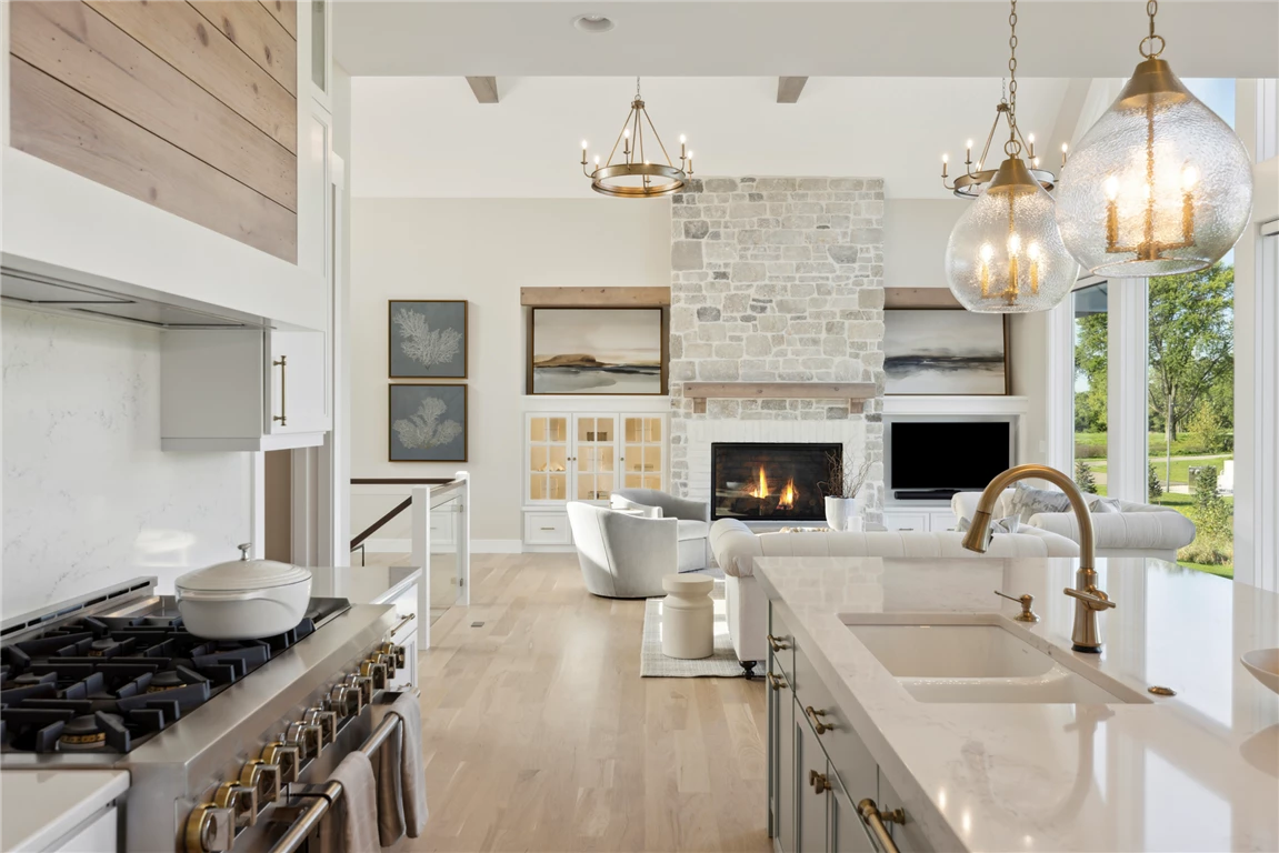 Contemporary luxury kitchen with stainless steel appliances and minimalist design.