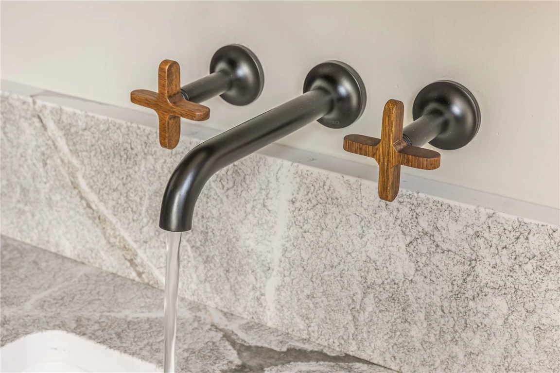 Antique minimalist bathroom with wooden faucet and bath.