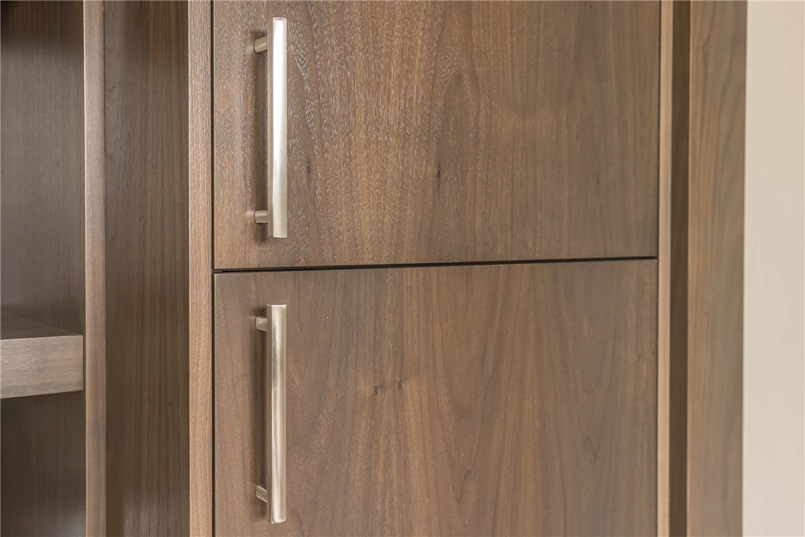 Closeup of a retro wooden cabinet with woodgrain detail.