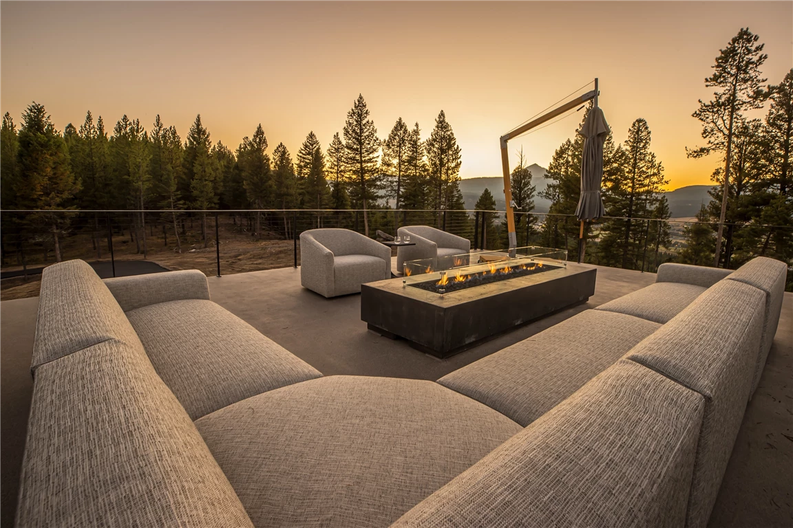 Luxury contemporary sofa in a modern interior with sunset lighting.