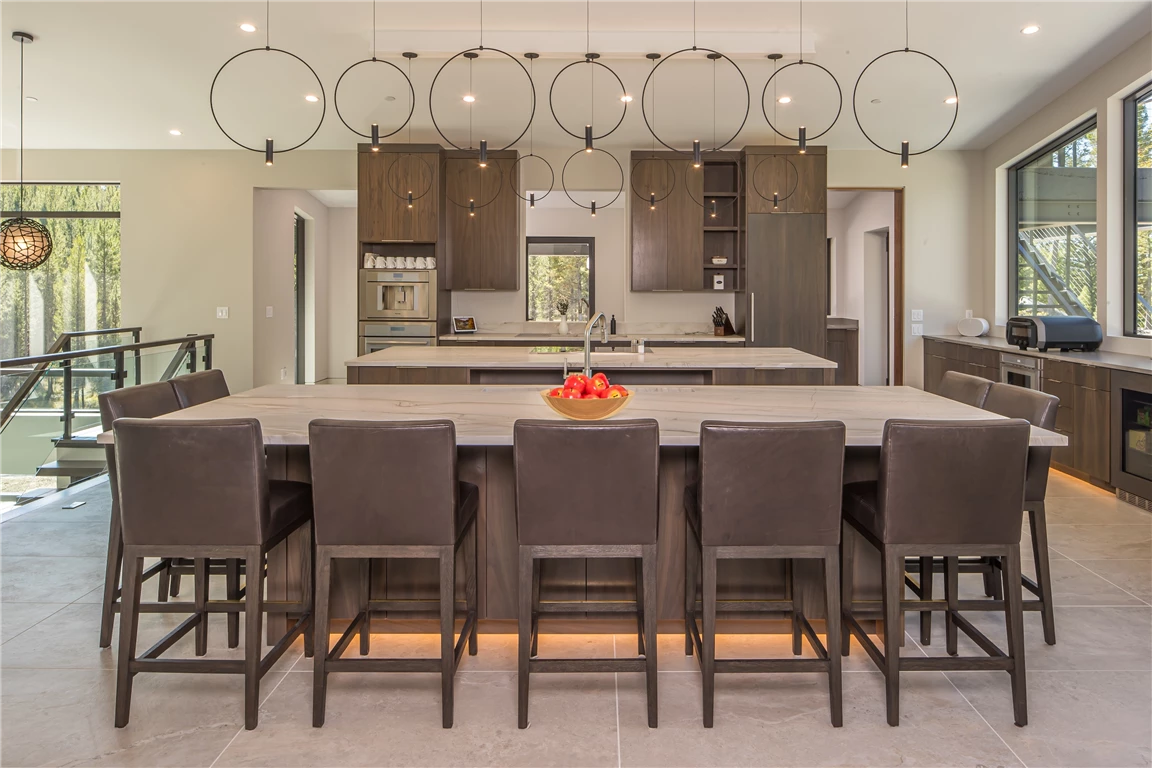 Luxurious contemporary dining room with elegant furniture and natural lighting.