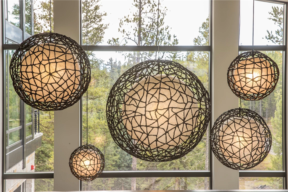 Spherical glass design with artistic patterns in a modern setting.