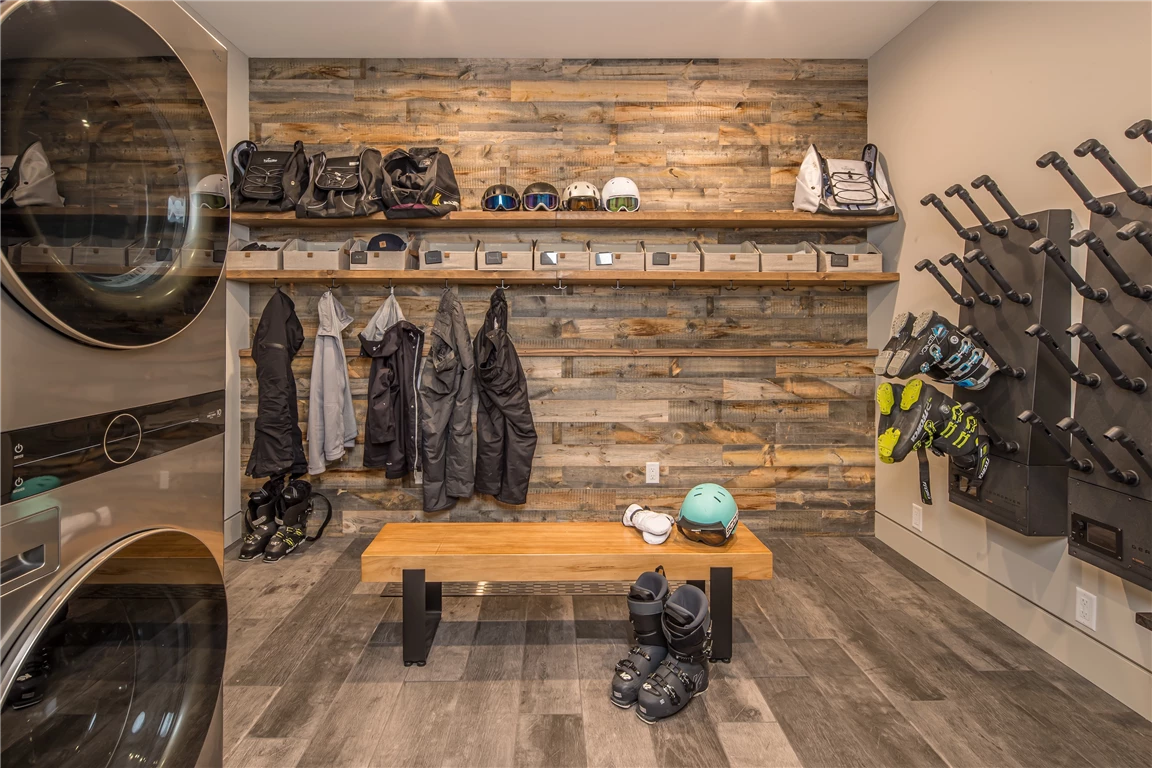 Modern mudroom interior with contemporary design and wooden elements.