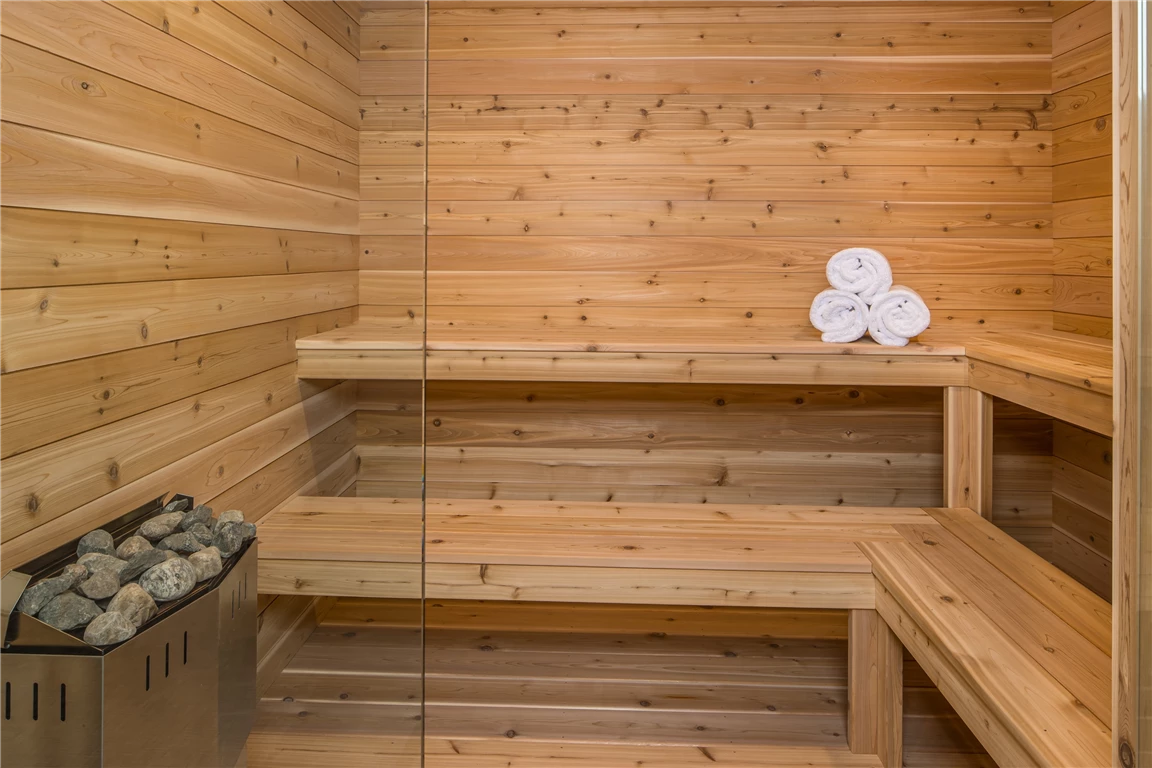 Interior view of a contemporary wooden sauna with luxurious design.